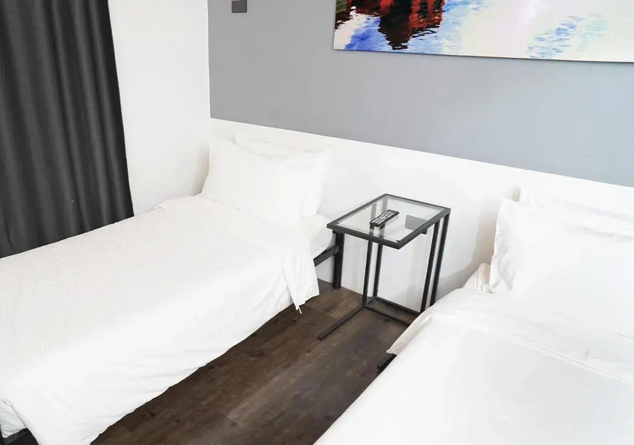 Bed in mySTAY Hotel BGC North